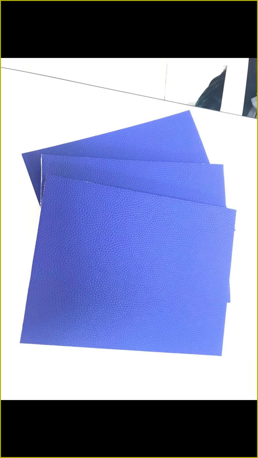 蓝色荔枝纹皮革防撞软包墙板样品，高密度海绵填充，适用于办案区审讯室墙面防撞防自伤